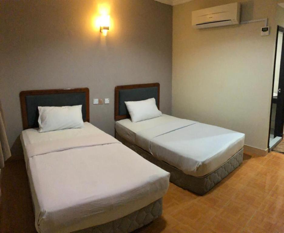 Hotel Perdana Lawas Buitenkant foto