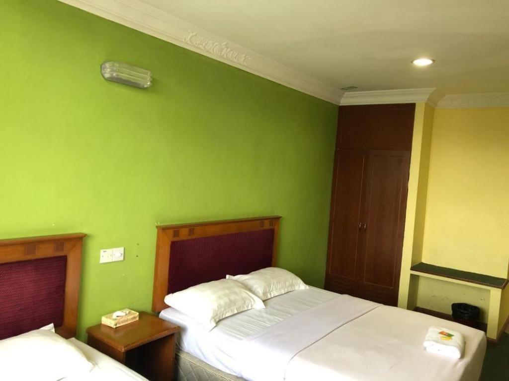 Hotel Perdana Lawas Buitenkant foto