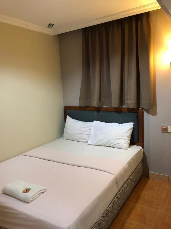 Hotel Perdana Lawas Buitenkant foto
