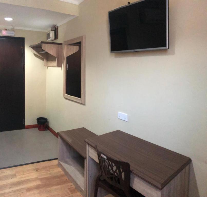Hotel Perdana Lawas Buitenkant foto