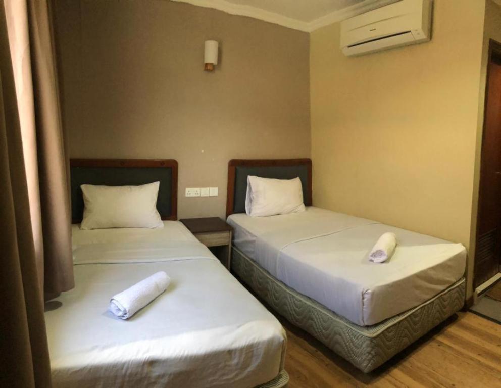 Hotel Perdana Lawas Buitenkant foto