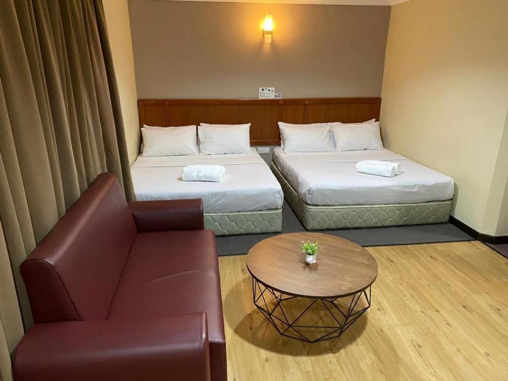 Hotel Perdana Lawas Buitenkant foto