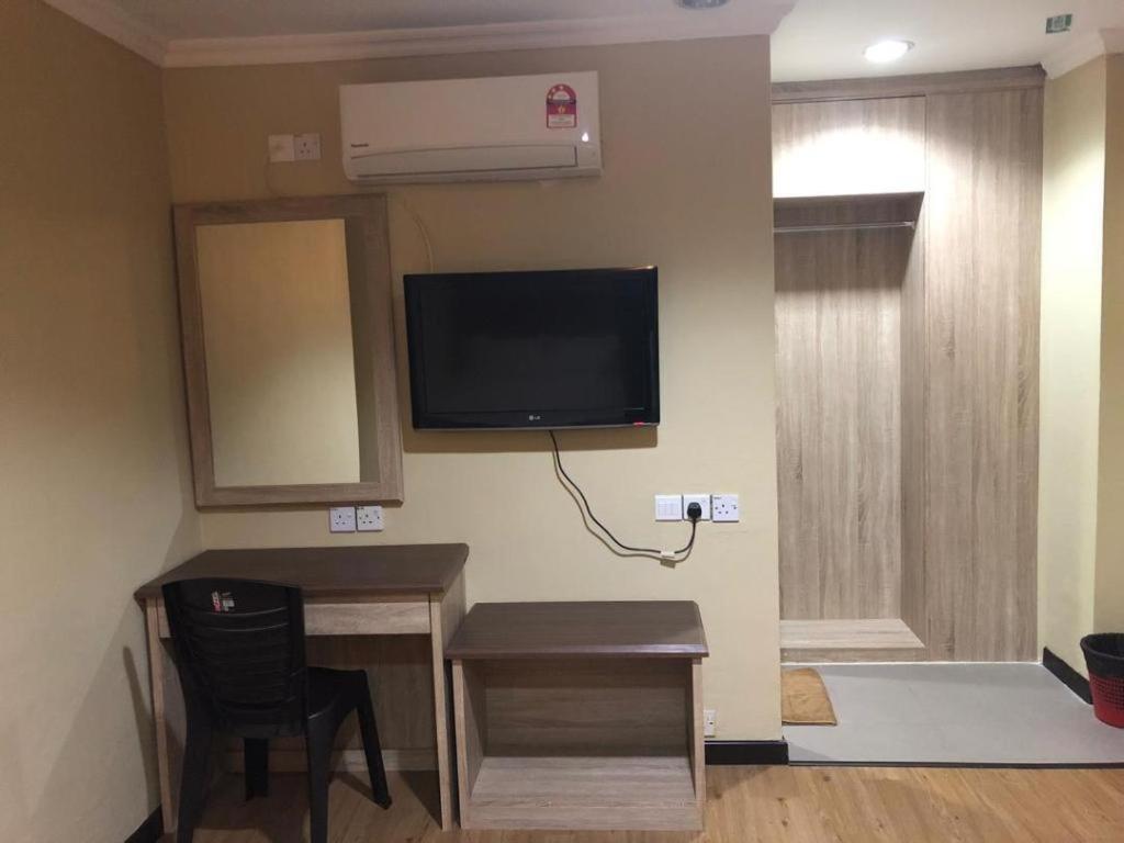 Hotel Perdana Lawas Buitenkant foto