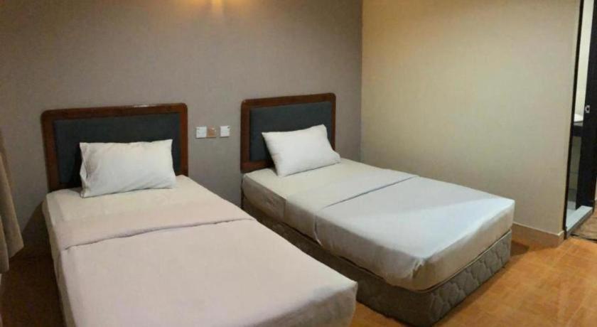 Hotel Perdana Lawas Buitenkant foto