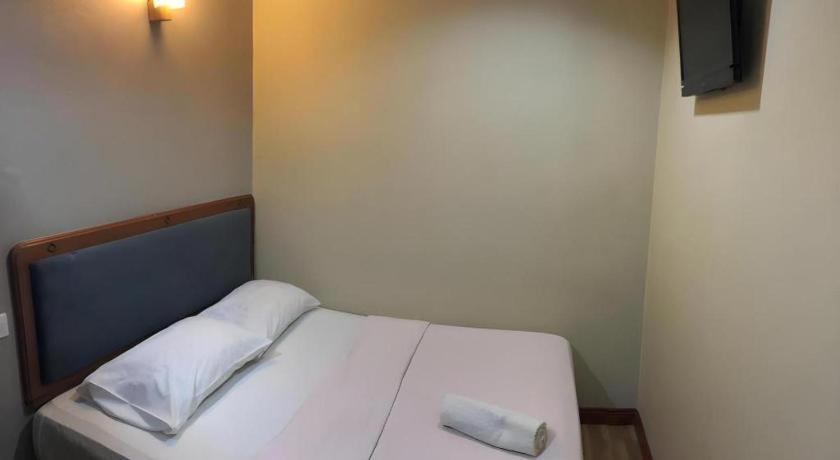 Hotel Perdana Lawas Buitenkant foto