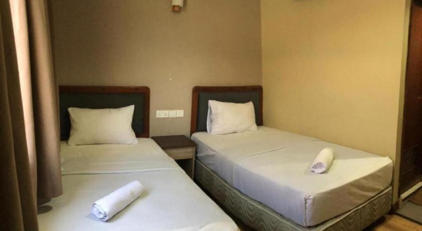 Hotel Perdana Lawas Buitenkant foto