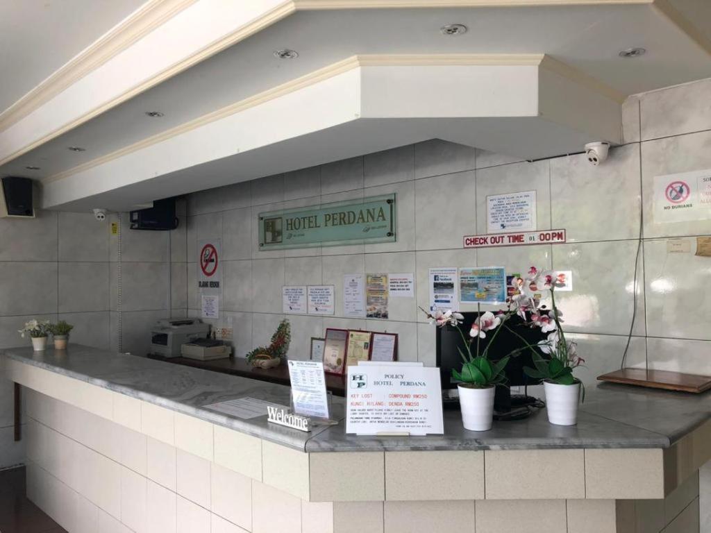 Hotel Perdana Lawas Buitenkant foto